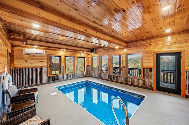 view of pool with a wall mounted air conditioner