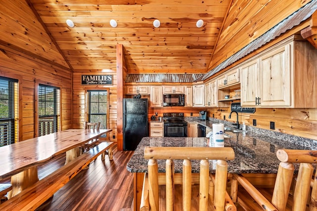 kitchen featuring dark wood-type flooring, wooden walls, black appliances, wooden ceiling, and kitchen peninsula