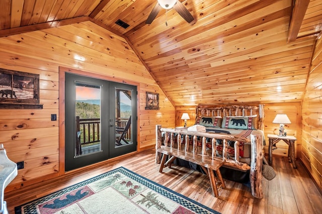 bedroom with hardwood / wood-style floors, access to outside, wooden ceiling, and french doors