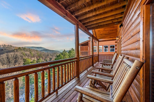 balcony at dusk with a mountain view