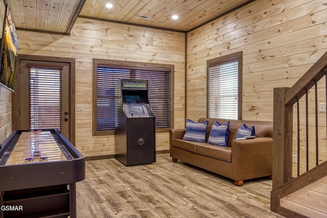 game room featuring wood ceiling, wooden walls, wood finished floors, and recessed lighting