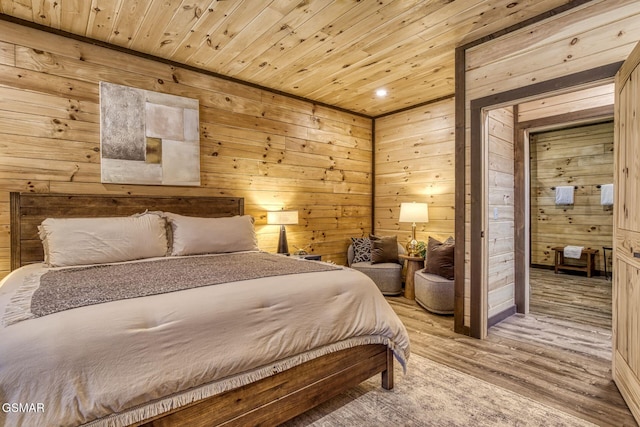 bedroom featuring wooden ceiling, wood walls, wood finished floors, and recessed lighting