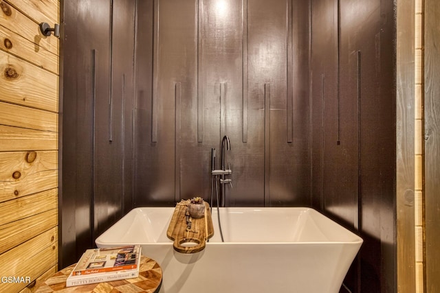 full bath with a soaking tub