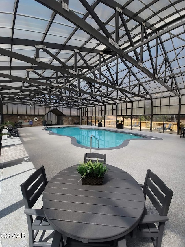 1503 Squirrel Nest Way, Sevierville, TN 37876 - indoor pool featuring a patio area and outdoor dining space
