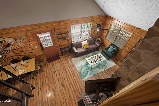 1503 Squirrel Nest Way, Sevierville, TN 37876 - living area featuring wooden walls, lofted ceiling, and wood finished floors