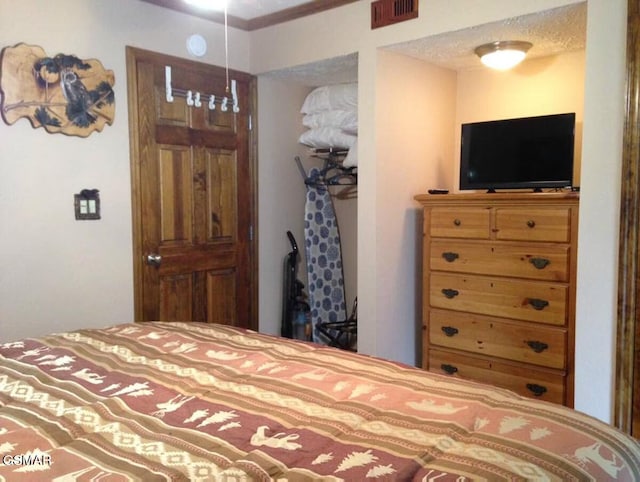 bedroom with visible vents