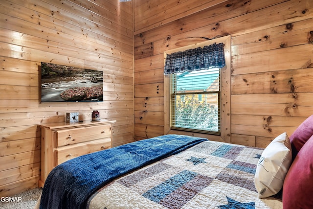 bedroom with wooden walls