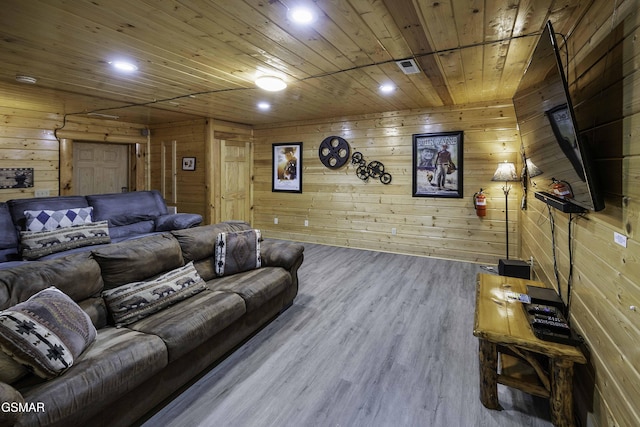 living room featuring wooden walls, wood ceiling, and hardwood / wood-style flooring