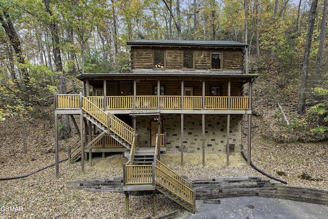 view of front of house featuring a wooden deck