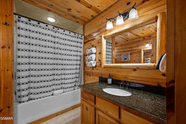 bathroom with vanity, shower / bath combination with curtain, wooden ceiling, and wooden walls