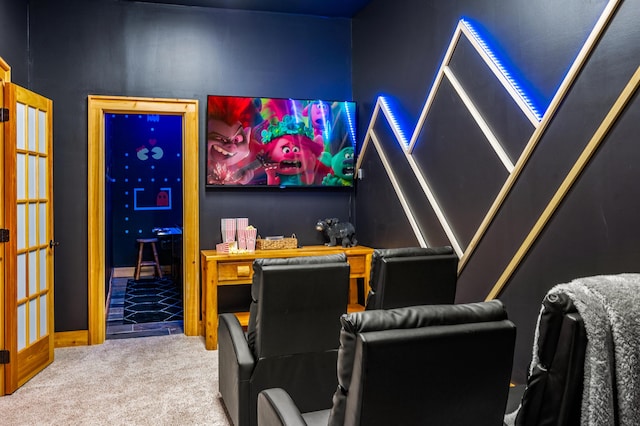 home theater room featuring carpet flooring