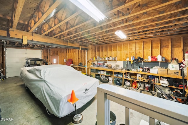 garage with a workshop area