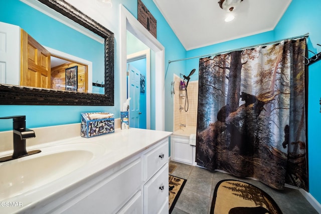 bathroom with shower / tub combo, tile patterned flooring, and vanity