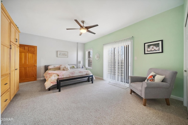 bedroom featuring carpet floors and baseboards