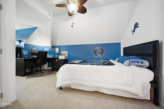 bedroom featuring lofted ceiling, a ceiling fan, and baseboards