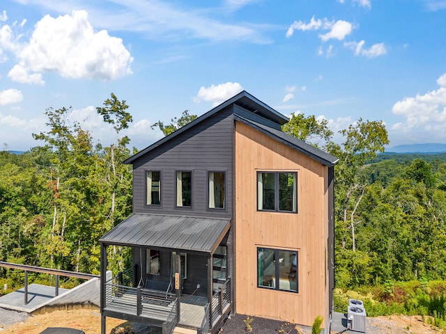 view of front of house with cooling unit