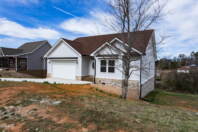 view of front of property featuring board and batten siding, a garage, driveway, and crawl space