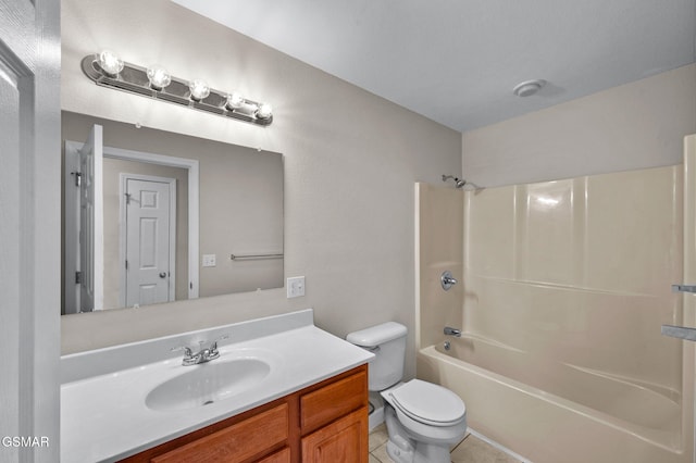 bathroom featuring vanity, bathing tub / shower combination, toilet, and tile patterned floors