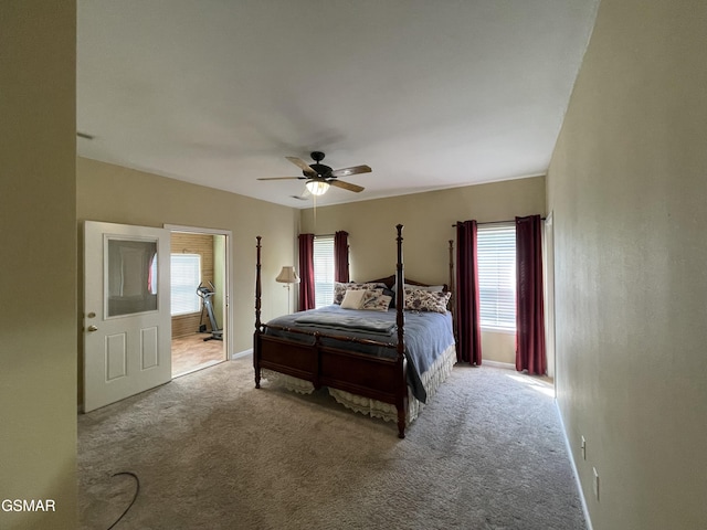 3351 Line Springs Rd, Sevierville, TN 37862 - carpeted bedroom with multiple windows, a ceiling fan, and ensuite bath