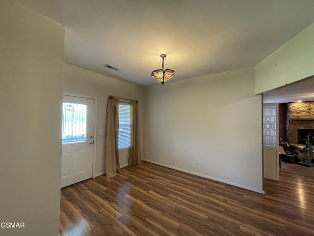 3351 Line Springs Rd, Sevierville, TN 37862 - unfurnished dining area featuring dark wood-style floors and a fireplace