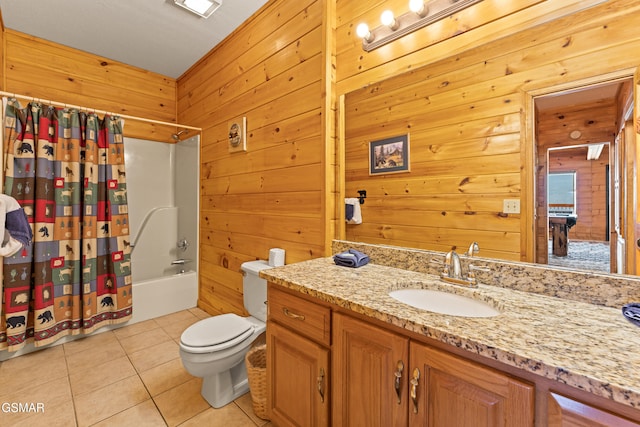 full bathroom featuring toilet, wood walls, vanity, shower / bath combination with curtain, and tile patterned flooring