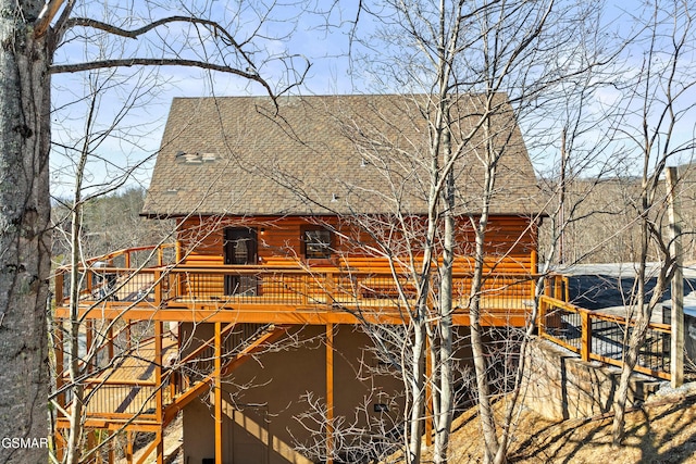 exterior space featuring a wooden deck