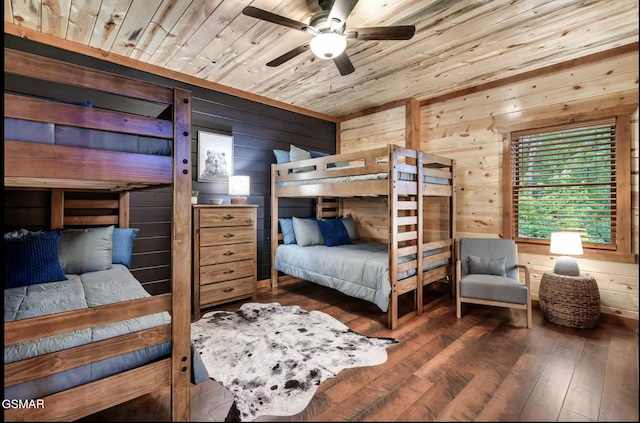 bedroom featuring wooden ceiling, wood walls, and hardwood / wood-style flooring