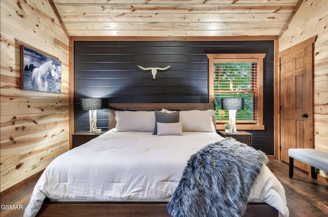 bedroom with lofted ceiling, wooden walls, and wood ceiling