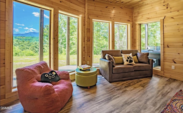 sunroom / solarium featuring wood ceiling