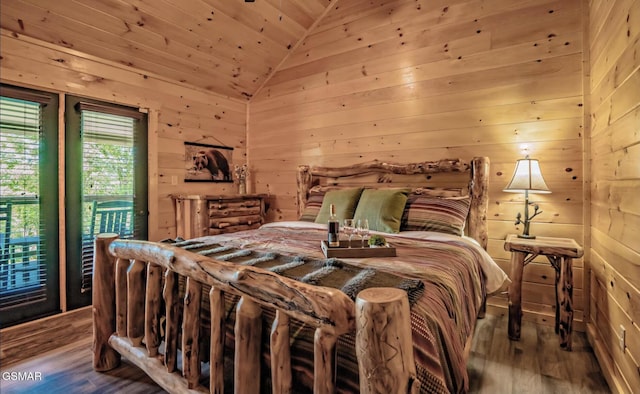 bedroom featuring hardwood / wood-style flooring, vaulted ceiling, access to outside, wooden ceiling, and wood walls