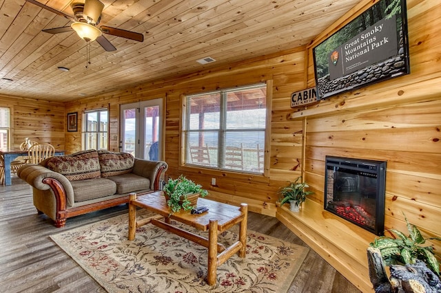 living room with ceiling fan, french doors, wood ceiling, and hardwood / wood-style flooring