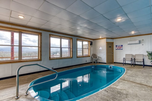 view of swimming pool featuring an AC wall unit