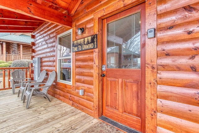 entrance to property with covered porch