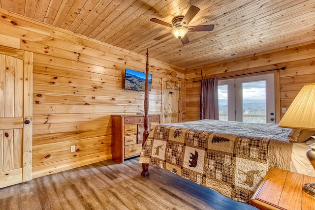 bedroom featuring wood-type flooring, access to outside, ceiling fan, and wood ceiling