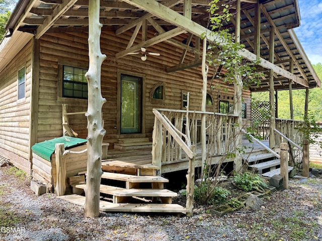 4205 Birds Creek Rd, Sevierville, TN 37876 - entrance to property featuring faux log siding and a deck