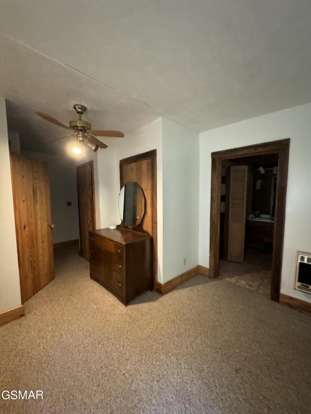 4205 Birds Creek Rd, Sevierville, TN 37876 - unfurnished bedroom with baseboards, heating unit, ceiling fan, and carpet flooring