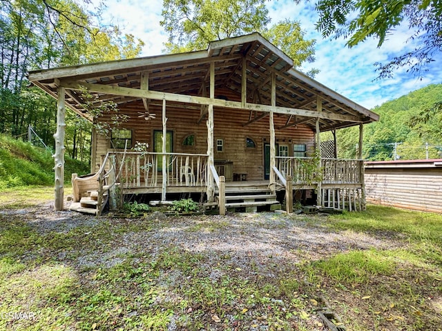4205 Birds Creek Rd, Sevierville, TN 37876 - rear view of house with a ceiling fan