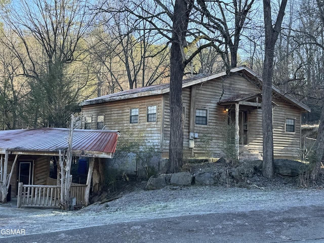 4205 Birds Creek Rd, Sevierville, TN 37876 - view of front facade featuring a porch and metal roof