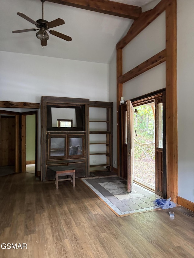 4205 Birds Creek Rd, Sevierville, TN 37876 - foyer featuring beam ceiling, high vaulted ceiling, a ceiling fan, wood finished floors, and baseboards