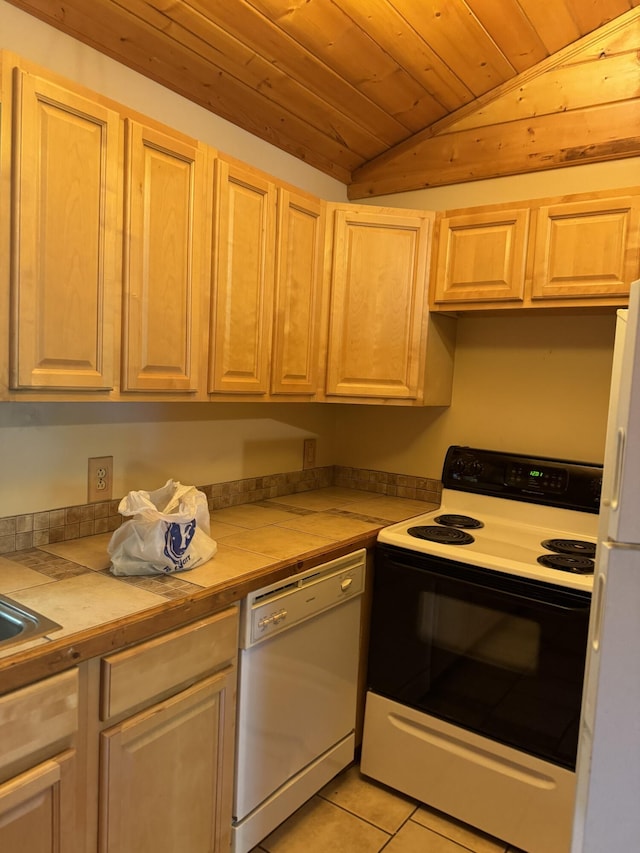 4205 Birds Creek Rd, Sevierville, TN 37876 - kitchen with white appliances, light tile patterned floors, lofted ceiling, light countertops, and wooden ceiling