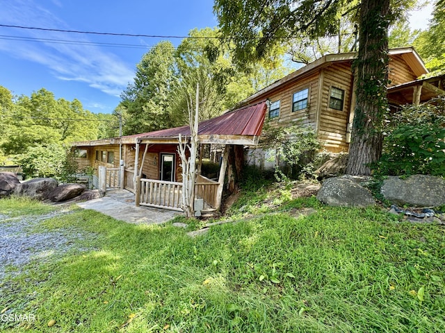 4205 Birds Creek Rd, Sevierville, TN 37876 - exterior space with metal roof