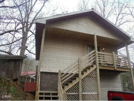 4205 Birds Creek Rd, Sevierville, TN 37876 - view of side of home featuring stairs