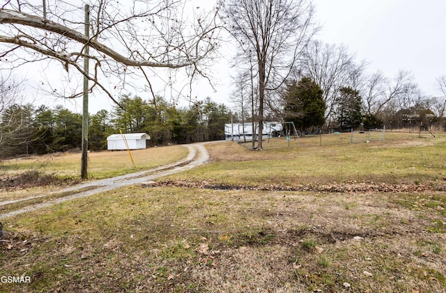 view of yard with a playground