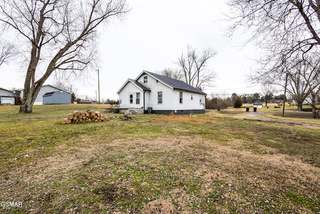 exterior space with a yard