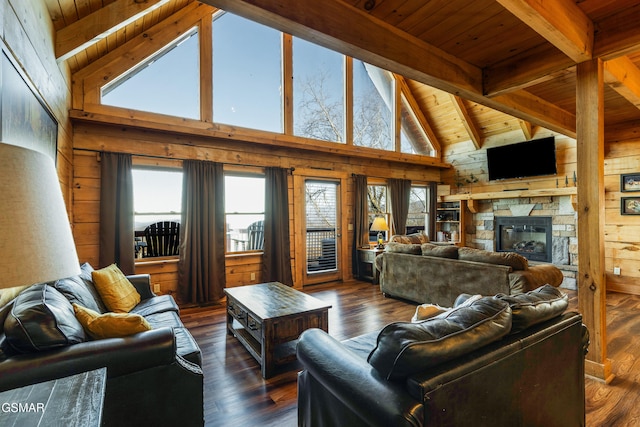 1274 Bear Cub Way, Gatlinburg, TN 37738 - living room with a stone fireplace, dark wood-style floors, wooden walls, and wooden ceiling
