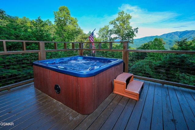 933 E Foothills Dr, Gatlinburg, TN 37738 - wooden deck featuring a hot tub and a mountain view