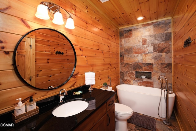 933 E Foothills Dr, Gatlinburg, TN 37738 - full bath featuring a freestanding bath, wooden walls, vanity, toilet, and wooden ceiling