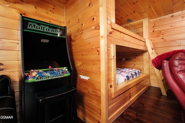 933 E Foothills Dr, Gatlinburg, TN 37738 - bedroom with wooden walls and dark wood finished floors
