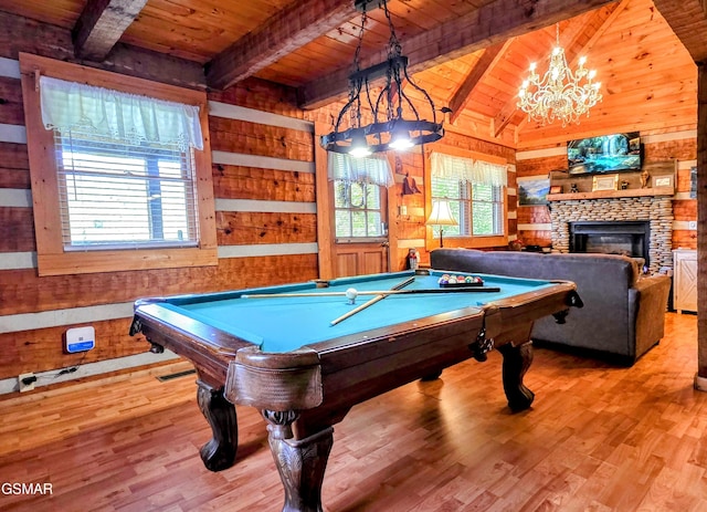 recreation room featuring wood ceiling, beam ceiling, wood walls, and billiards