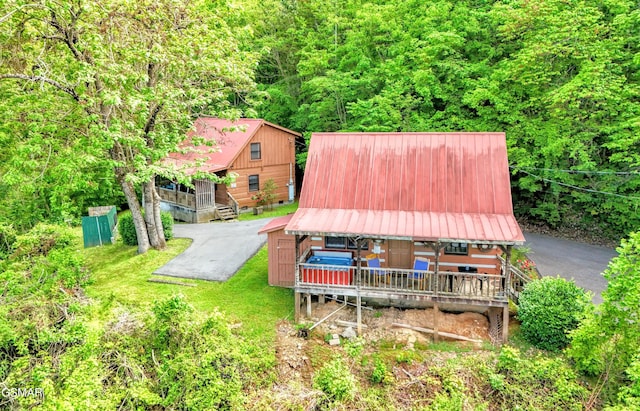 aerial view with a wooded view